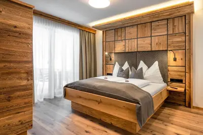 Ein Bett oder Betten in einem Zimmer der Unterkunft Ellmauer Hex Appartements