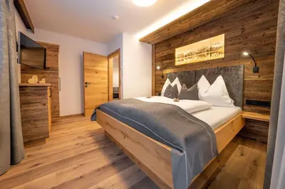Ein Bett oder Betten in einem Zimmer der Unterkunft Ellmauer Hex Appartements