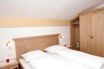 Ein Bett oder Betten in einem Zimmer der Unterkunft Filzenhof