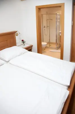 Ein Bett oder Betten in einem Zimmer der Unterkunft Filzenhof