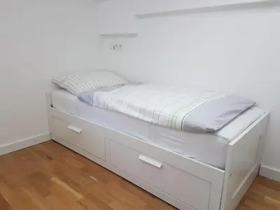 Ein Bett oder Betten in einem Zimmer der Unterkunft Ferienwohnung Rainer