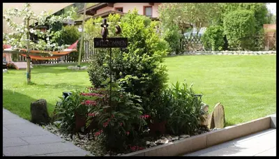 Ein Garten an der Unterkunft Apartment Tirol