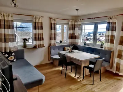 Ein Sitzbereich in der Unterkunft Apartment Kolb