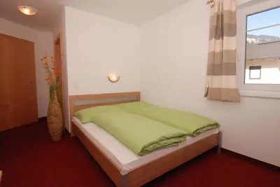 Ein Bett oder Betten in einem Zimmer der Unterkunft Apartment Kolb