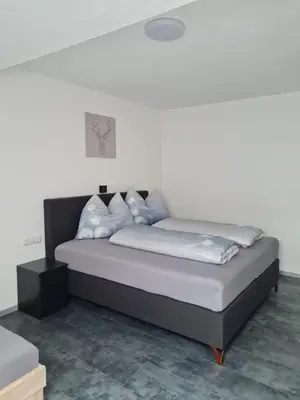 Ein Bett oder Betten in einem Zimmer der Unterkunft Haus Michael