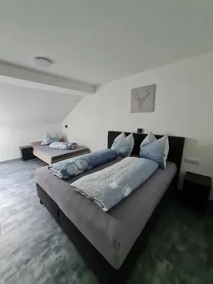 Ein Bett oder Betten in einem Zimmer der Unterkunft Haus Michael