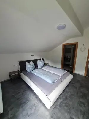 Ein Bett oder Betten in einem Zimmer der Unterkunft Haus Michael