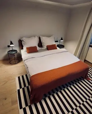 Ein Bett oder Betten in einem Zimmer der Unterkunft Mami Fee Familien Ferienhaus Hopfgarten
