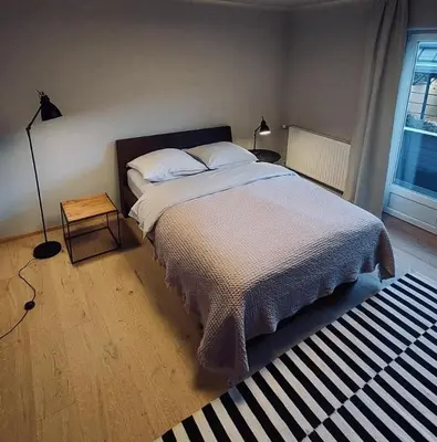 Ein Bett oder Betten in einem Zimmer der Unterkunft Mami Fee Familien Ferienhaus Hopfgarten