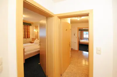 Ein Bett oder Betten in einem Zimmer der Unterkunft Riederhof