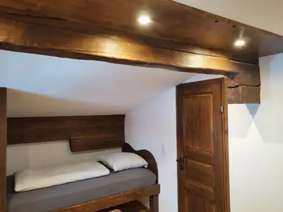 Ein Bett oder Betten in einem Zimmer der Unterkunft Bonapart