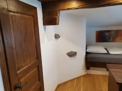 Ein Bett oder Betten in einem Zimmer der Unterkunft Bonapart