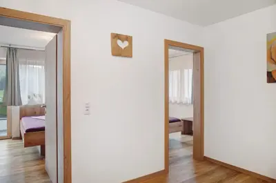 Ein Bett oder Betten in einem Zimmer der Unterkunft Bergliebe Apartments