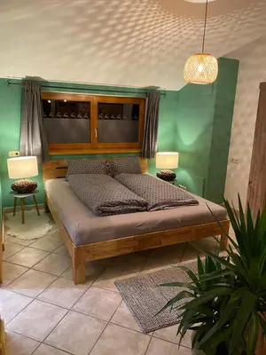 Ein Bett oder Betten in einem Zimmer der Unterkunft Sepps Appartement