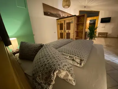 Ein Bett oder Betten in einem Zimmer der Unterkunft Sepps Appartement