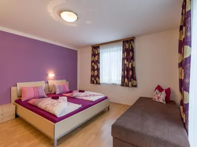 Ein Bett oder Betten in einem Zimmer der Unterkunft Alte Schmiede Talbach