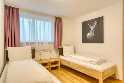 Ein Bett oder Betten in einem Zimmer der Unterkunft Natur Residenz Bad Häring