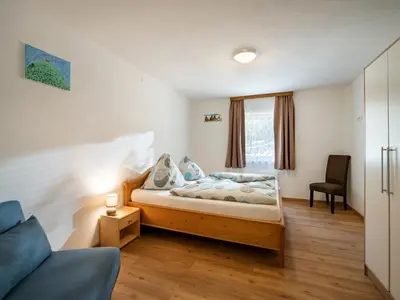 Ein Bett oder Betten in einem Zimmer der Unterkunft Apartement Eil