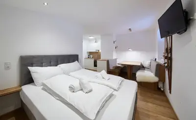 Ein Bett oder Betten in einem Zimmer der Unterkunft Appartement Bergzeit