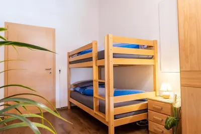Ein Bett oder Betten in einem Zimmer der Unterkunft Starmacher Hof