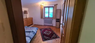 Ein Bett oder Betten in einem Zimmer der Unterkunft Villa Alpenblick