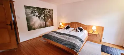 Ein Bett oder Betten in einem Zimmer der Unterkunft Villa Alpenblick