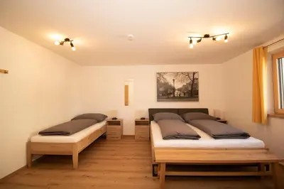 Ein Bett oder Betten in einem Zimmer der Unterkunft Apart Christof