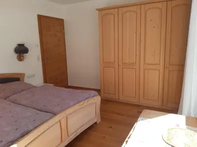 Ein Bett oder Betten in einem Zimmer der Unterkunft Ferienwohnung Widmann