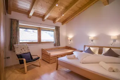 Ein Bett oder Betten in einem Zimmer der Unterkunft Apart Pfister