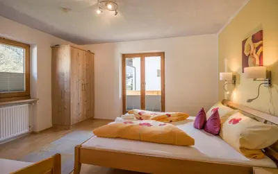 Ein Bett oder Betten in einem Zimmer der Unterkunft Apart Pfister