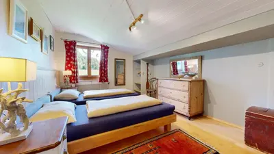Ein Bett oder Betten in einem Zimmer der Unterkunft Ferienhaus Chalet Kitzalp