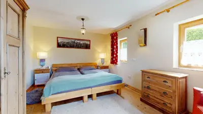 Ein Bett oder Betten in einem Zimmer der Unterkunft Ferienhaus Chalet Kitzalp