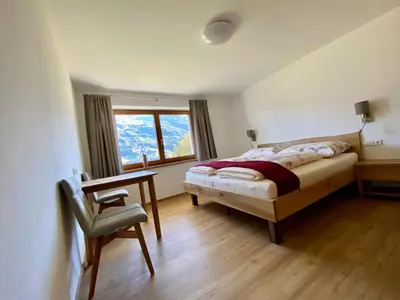 Ein Bett oder Betten in einem Zimmer der Unterkunft Ferienwohnung Trattner