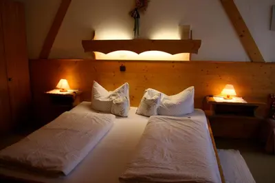 Ein Bett oder Betten in einem Zimmer der Unterkunft Gasthof Pension Lanzenhof