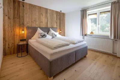 Ein Bett oder Betten in einem Zimmer der Unterkunft Buchberg Apartments, Ferienwohnung