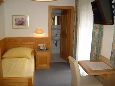 Ein Bett oder Betten in einem Zimmer der Unterkunft Pension Rieder