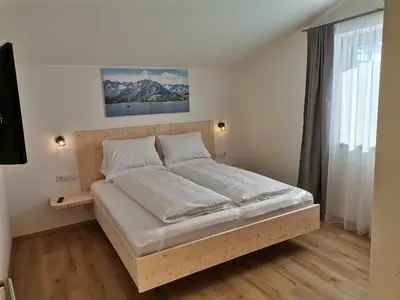 Ein Bett oder Betten in einem Zimmer der Unterkunft Apart Leibrecht