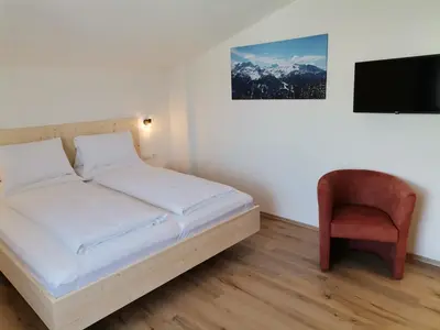 Ein Bett oder Betten in einem Zimmer der Unterkunft Apart Leibrecht