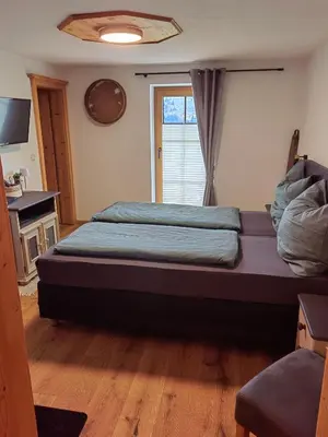 Ein Bett oder Betten in einem Zimmer der Unterkunft Bergbauernhof Obergaisberg