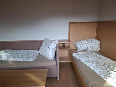 Ein Bett oder Betten in einem Zimmer der Unterkunft Appartement Geisler