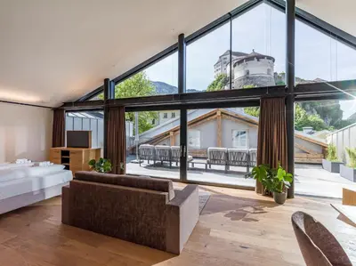 Ein Bett oder Betten in einem Zimmer der Unterkunft Platzhirsch Kufstein