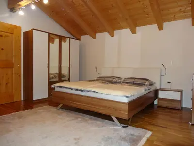 Ein Bett oder Betten in einem Zimmer der Unterkunft Ferienwohnung Irmgard
