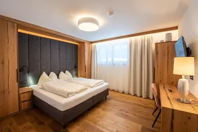 Ein Bett oder Betten in einem Zimmer der Unterkunft Chalet Hochkrimml 43