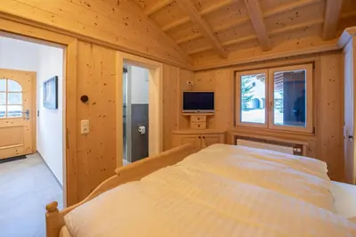 Ein Bett oder Betten in einem Zimmer der Unterkunft Chalet Hochkrimml 43