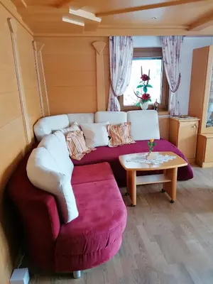 Ein Sitzbereich in der Unterkunft Ferienwohnung Kaiserblick Kössen