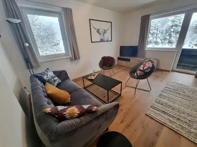 Ein Sitzbereich in der Unterkunft Ferienwohnung Kurz