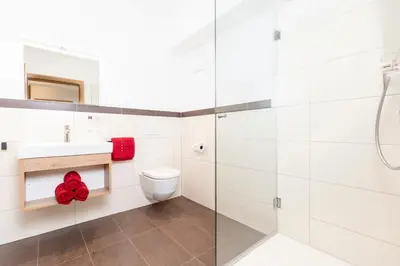 Ein Badezimmer in der Unterkunft Herzstück Appartements Zillertal