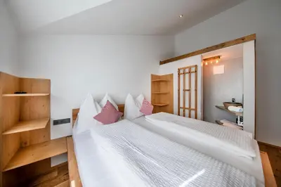 Ein Bett oder Betten in einem Zimmer der Unterkunft Bergblick Apartment