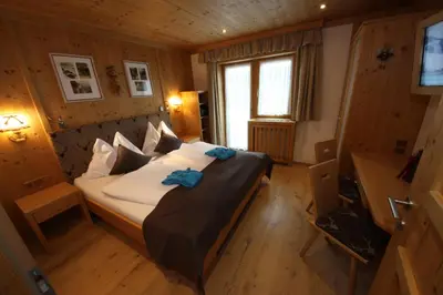 Ein Bett oder Betten in einem Zimmer der Unterkunft TALHEIMER Grias di & Hoamat since 1958 inklusive Therme TAUERN SPA & Jokercard