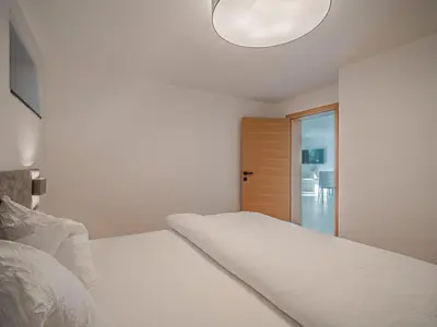 Ein Bett oder Betten in einem Zimmer der Unterkunft Apartement am Lift XL